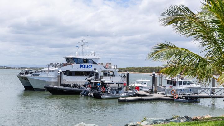 police boats moored at pontoon