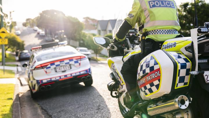 Police motorcycle and car