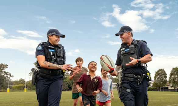Police officers in the community at kids sports