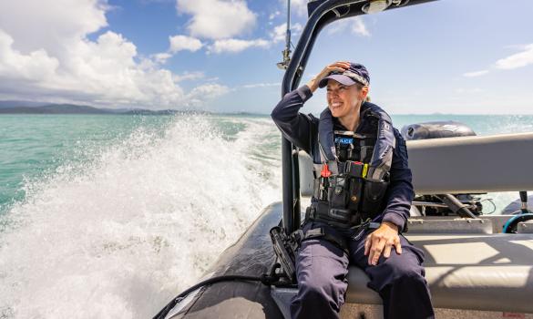 Queensland police officer patrolling water off Airlie Beach