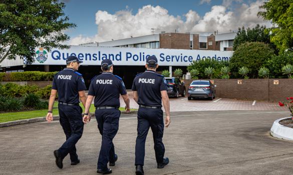 recruits walking past QPS Academy office in Brisbane