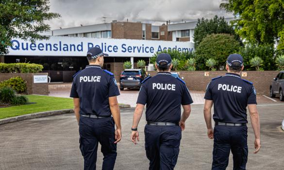 PACE recruits walking through QPS Academy