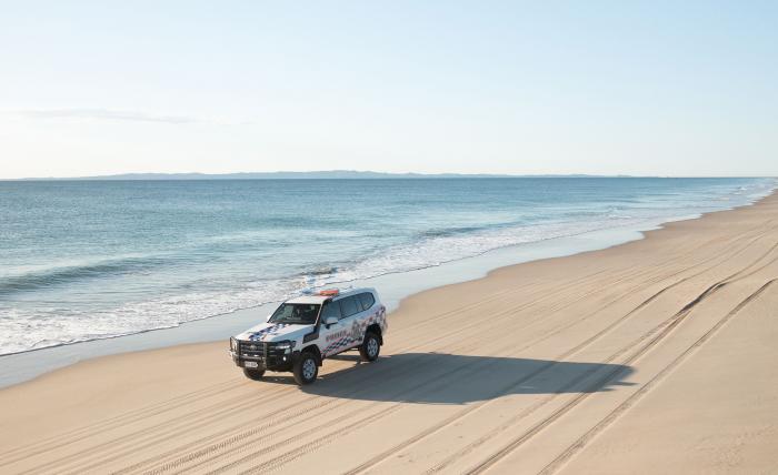 police vehicle on beach