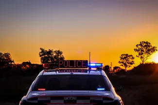 police car and sunset