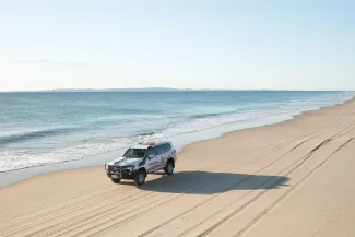 police vehicle on beach