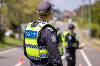 Frontline police officer standing at RBT line